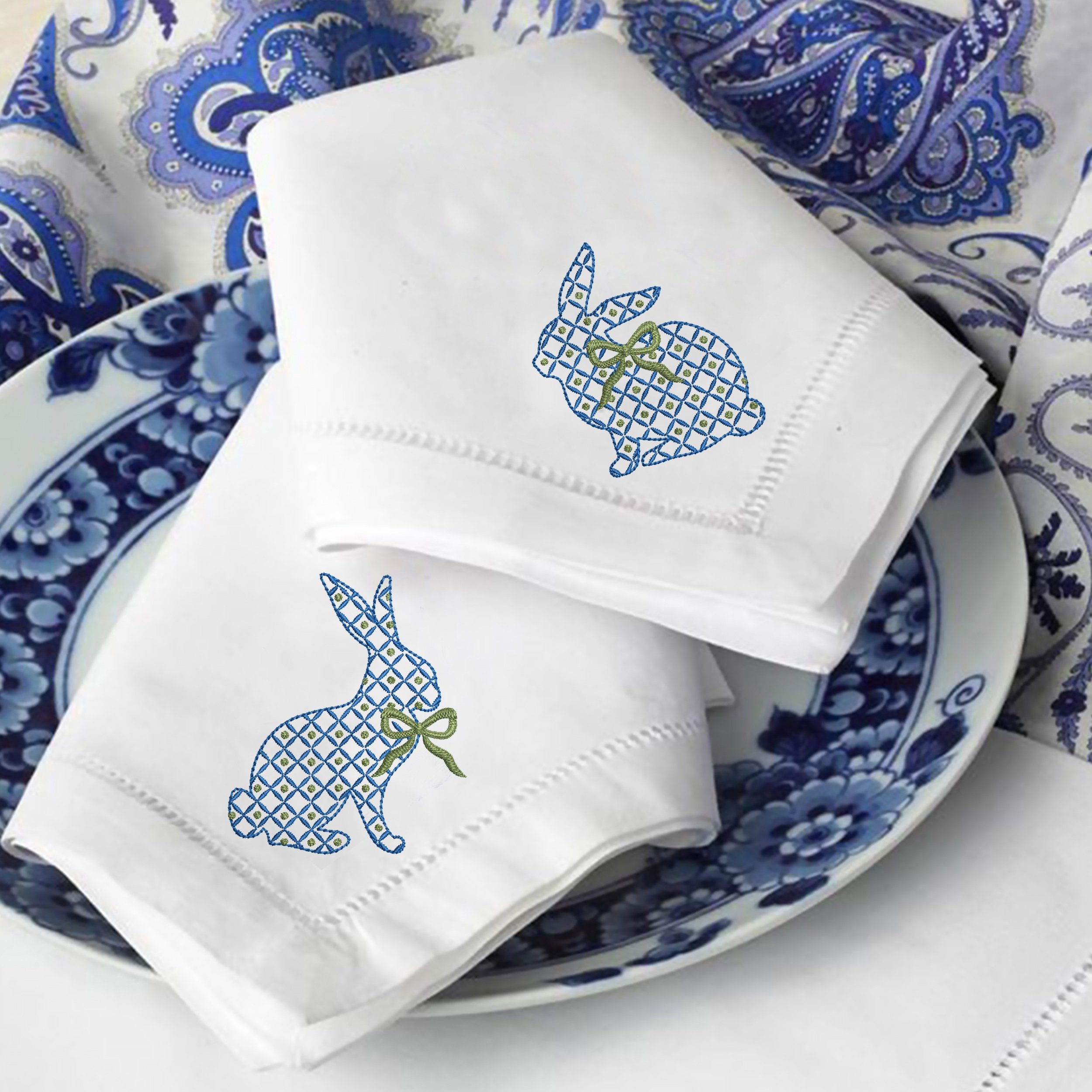 Blue and White Easter Bunnies with a Chinoiserie Lemon Tree for Machine Embroidery embroidered on a napkin set
