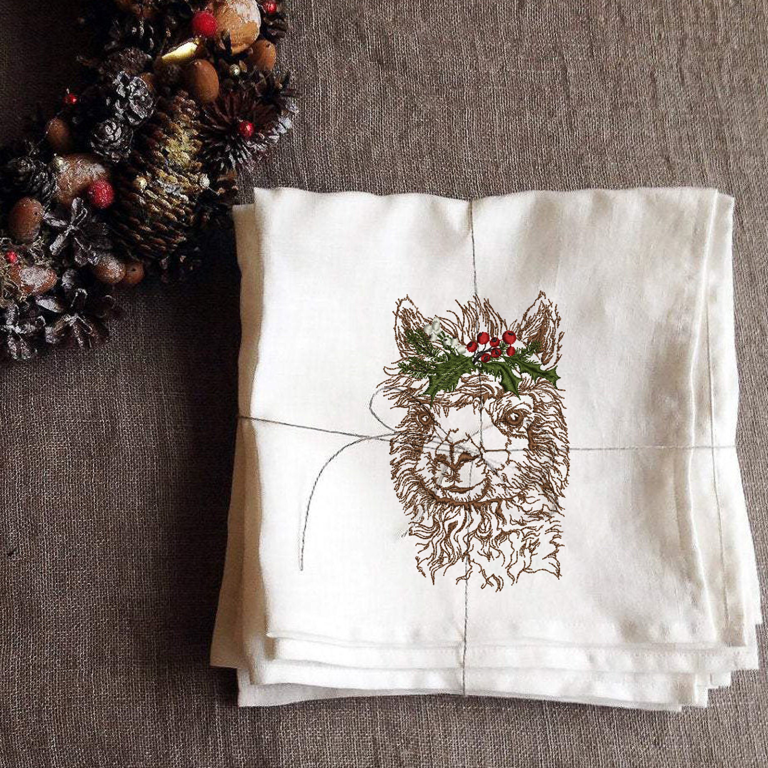 Christmas Llama Machine Embroidery Design embroidered on a napkin