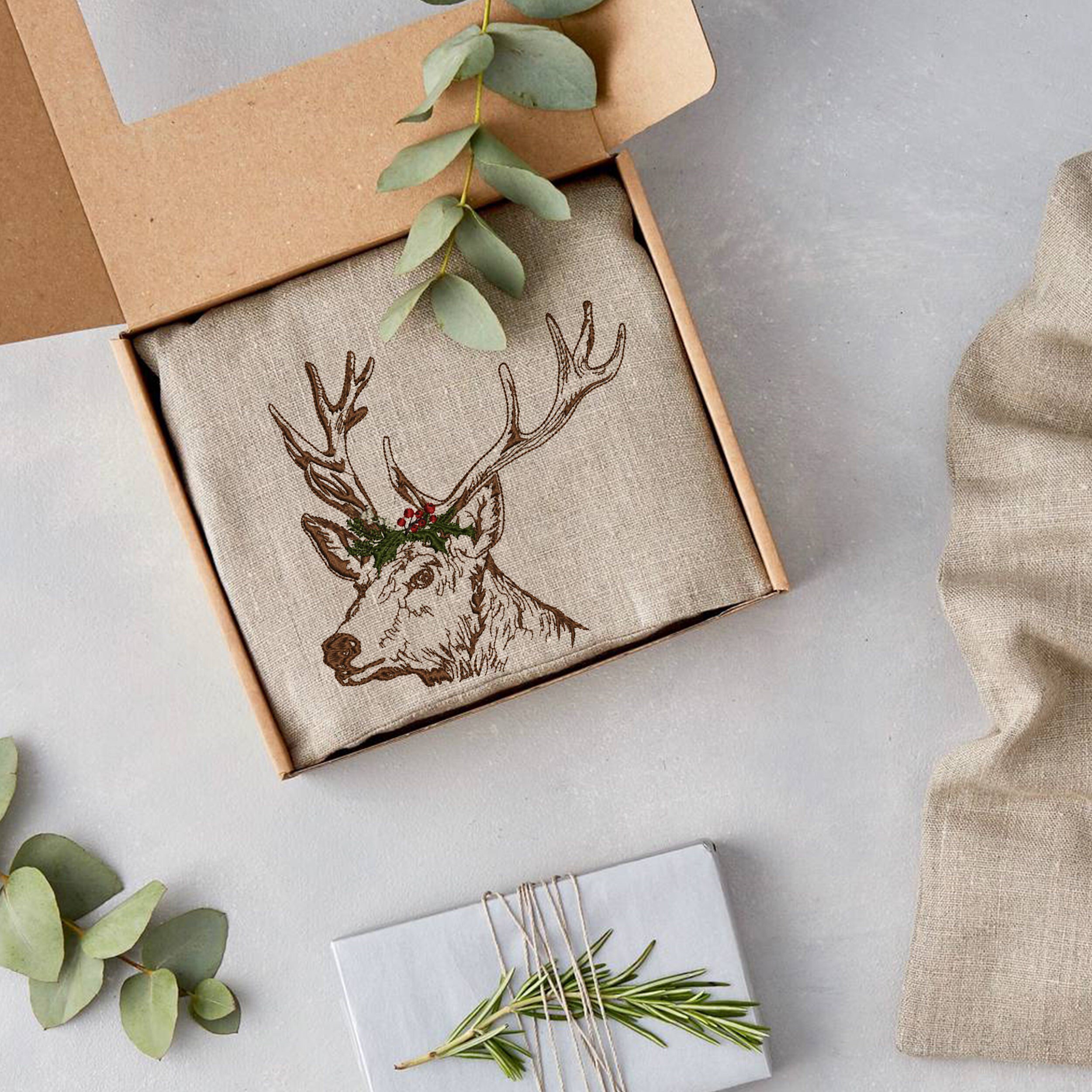 Christmas Deer Machine Embroidery Design embroidered on a winter holiday gift idea