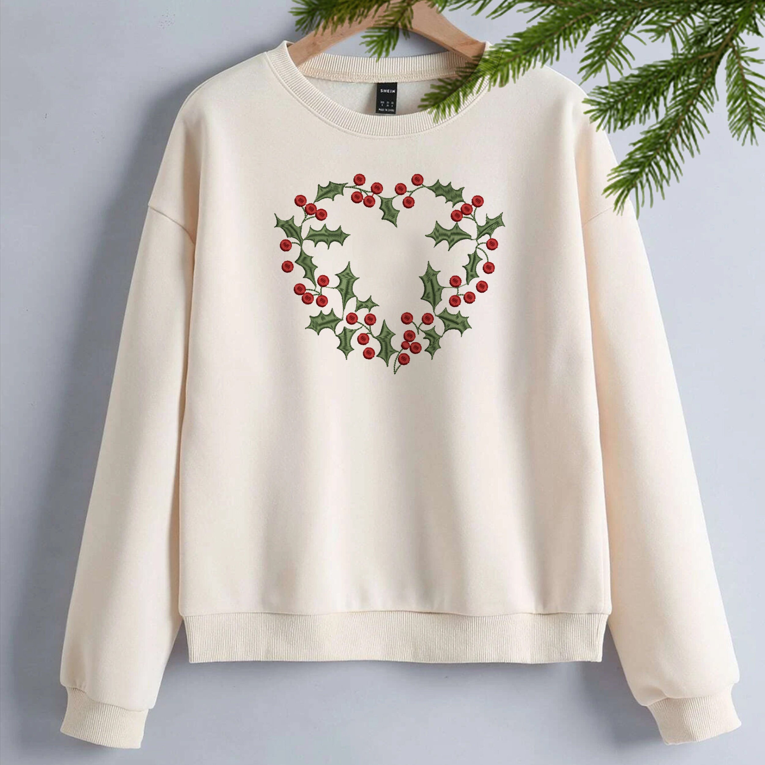 Lovely Christmas Machine Embroidery Bundle embroidered on a sweater