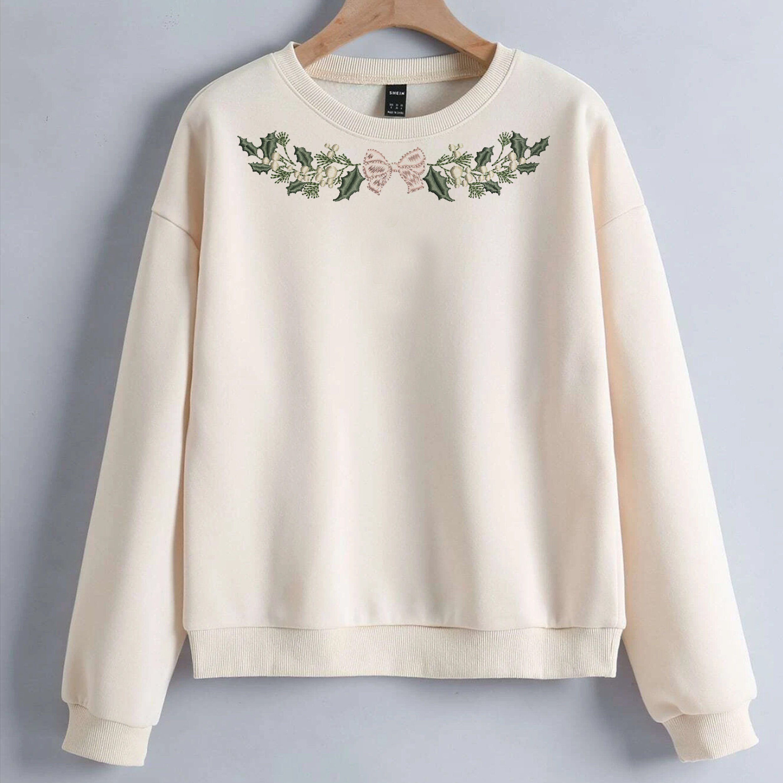 Romantic Christmas Tree Machine Embroidery Design embroidered on a sweatshirt