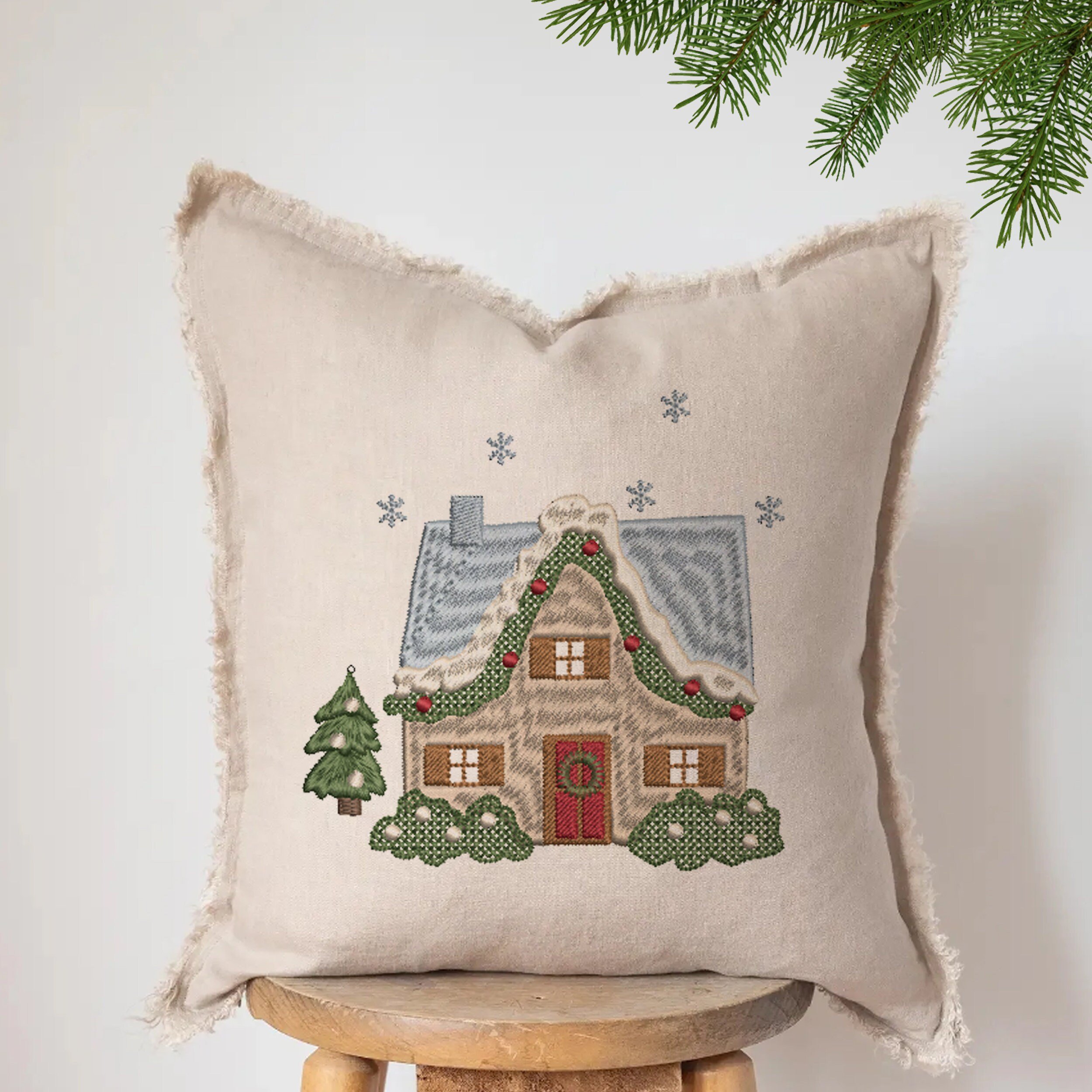 Playful Christmas Elements for Machine Embroidery File embroidered on holiday pillow