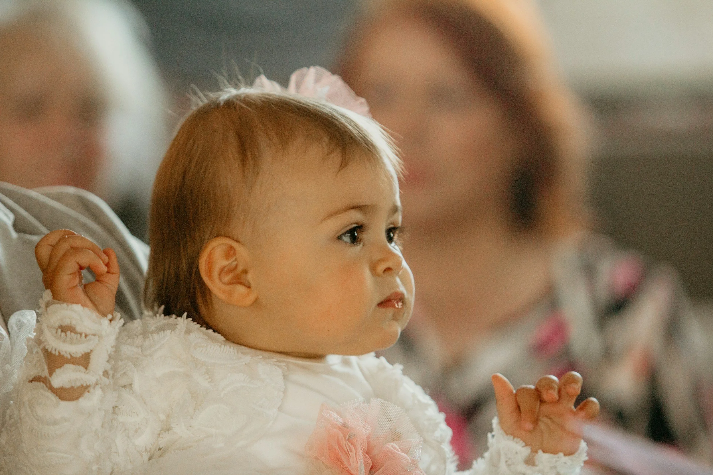 Baby listening to parents at Butterflies