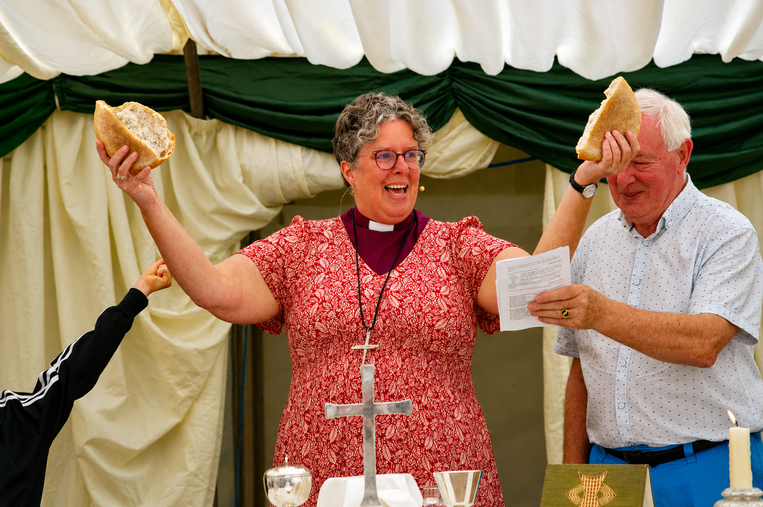 Bishop Mary leading us in Communion at Wargrave Festival.
