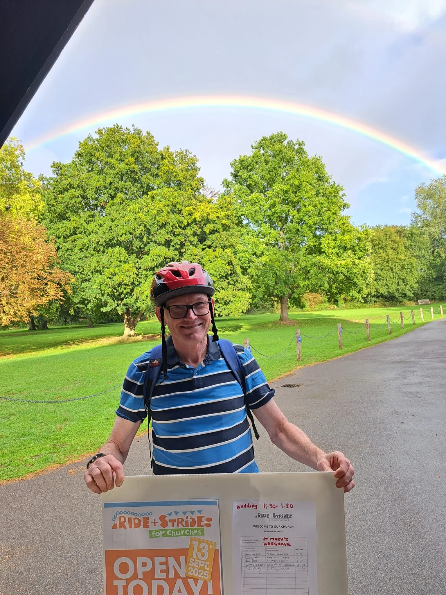 Churchwarden Mark Puddy being blessed before the start of his cycle for Ride+Stride 2025