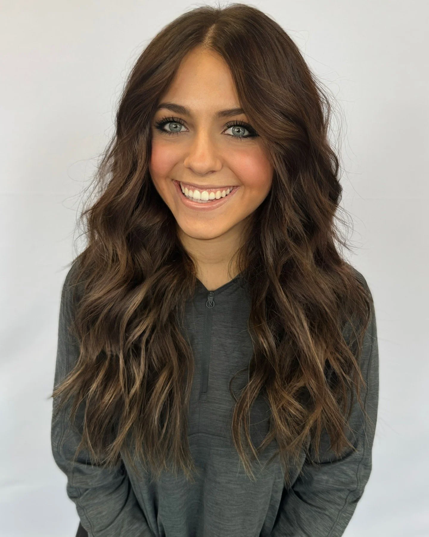 From shoulder length to mermaid waves swipe to see her hair before the color then before the hair extensions too. 

Two rows of hidden bead wefts with custom-colored EasiHair Pro Slim Wefts in 18&ndash;20 inches, glossed and blended for a rich brunet