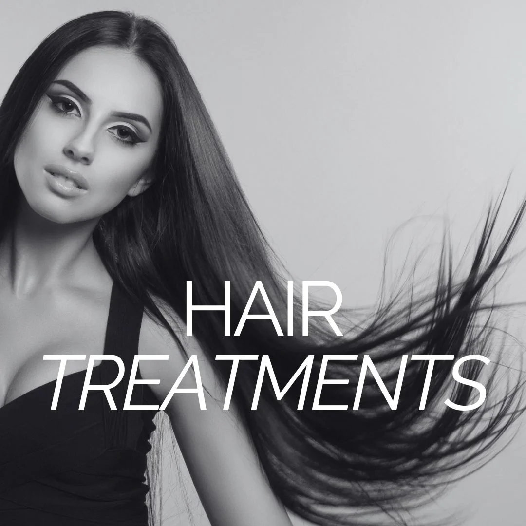 A black and white photo of a woman with long, flowing hair and makeup, with the text "Hair Treatments" overlayed.
