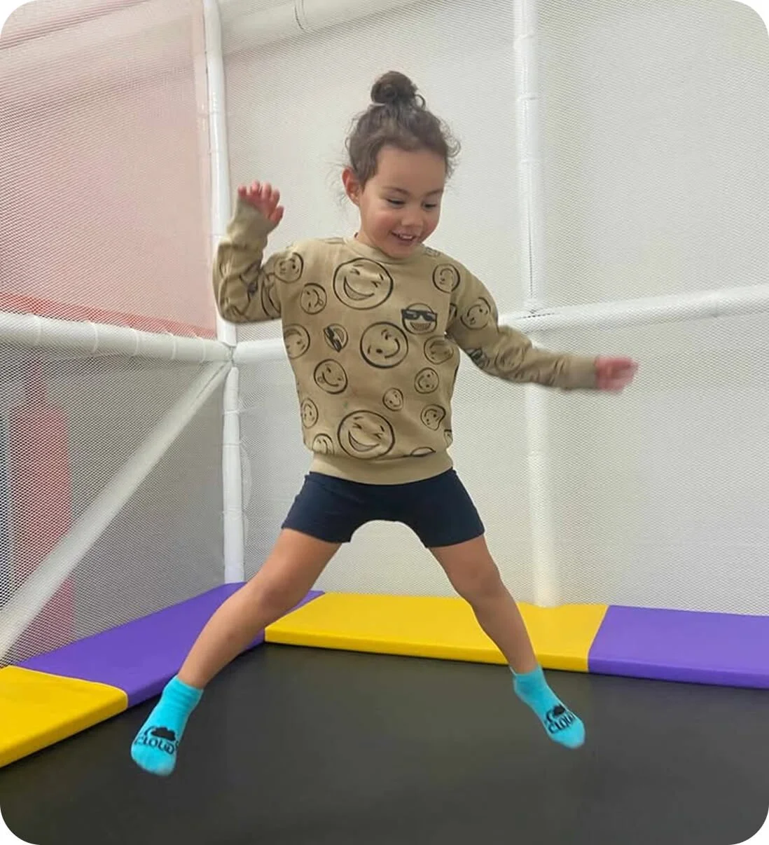 Children playing on the trampoline at Little Nui