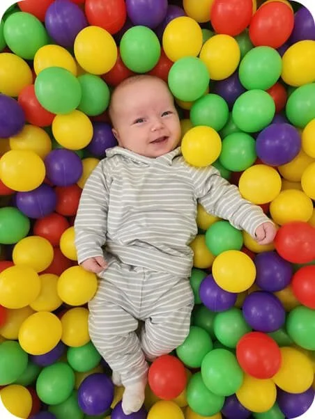 Children playing in the ball pit at Little Nui