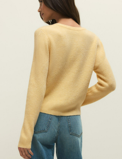 Shop a relaxed crewneck ribbed cardigan crafted from cozy sweater yarns. Features a button-front design and midweight feel for easy layering.