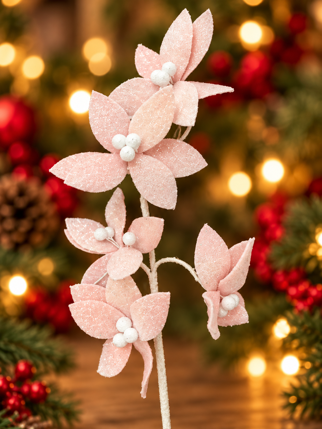 Glittery Pink Poinsettia Holiday Stem.png