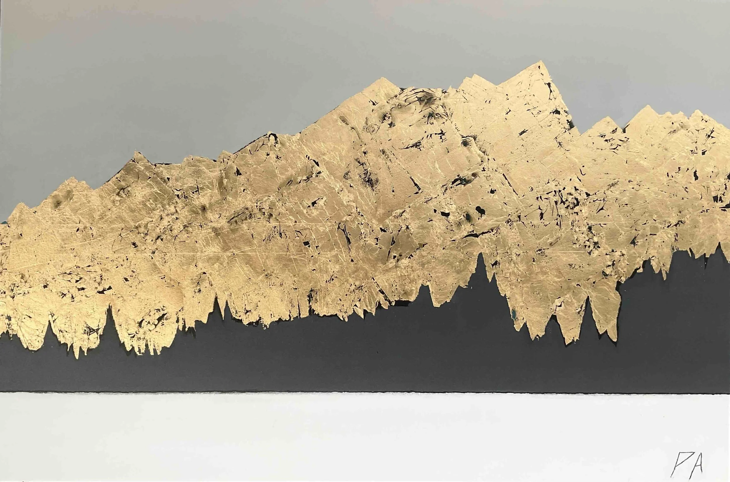 The reflection of the Remarkables across the lake in gold leaf.