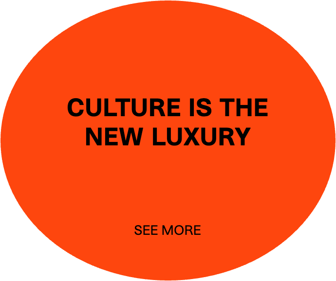 Orange circle with bold black text that says 'CULTURE IS THE NEW LUXURY' and smaller text below that says 'SEE MORE'.