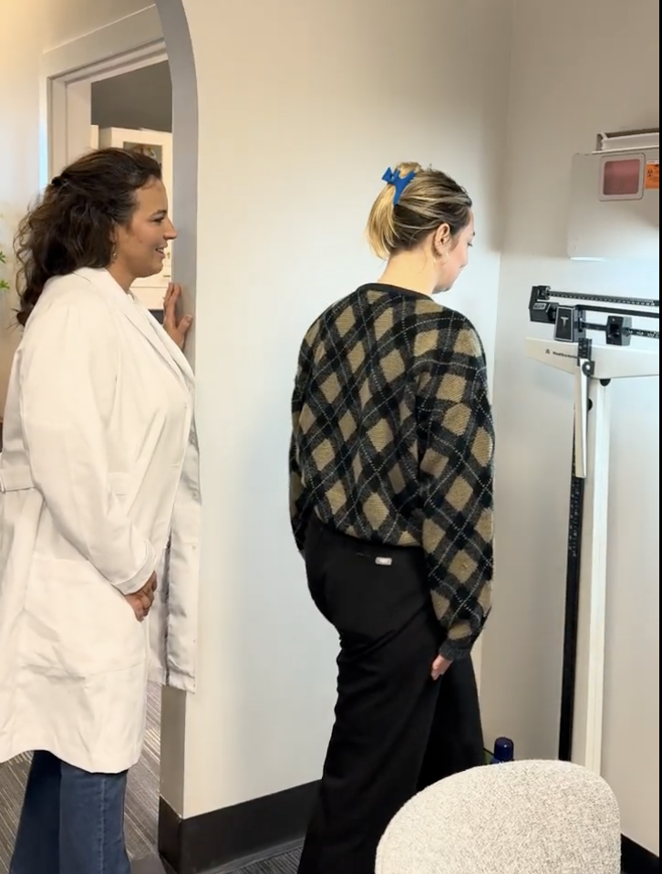 Person achieving weight loss goals through fitness and healthy living, showcasing a slimmer physique and improved confidence.