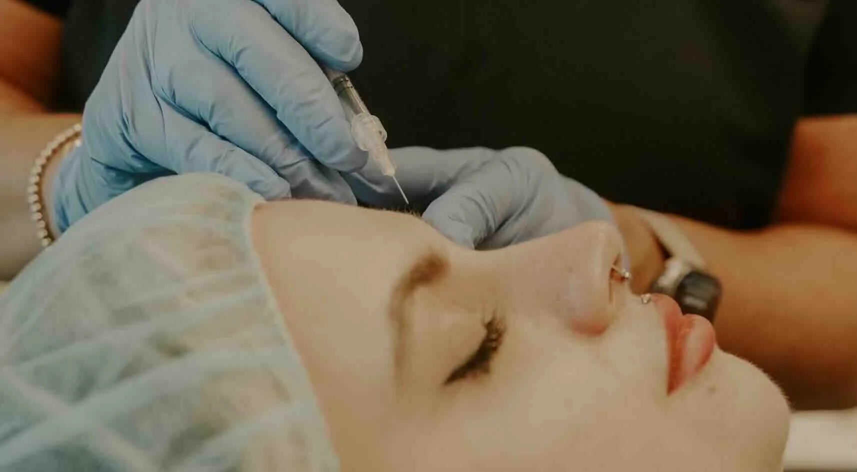 Close-up of a patient receiving wrinkle smoothing injections to reduce fine lines and achieve smoother, more youthful skin.