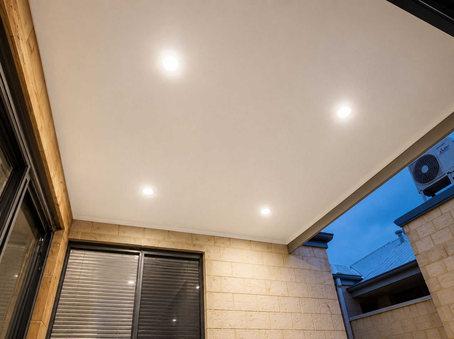 Energy-efficient LED downlights installed in an outdoor patio ceiling