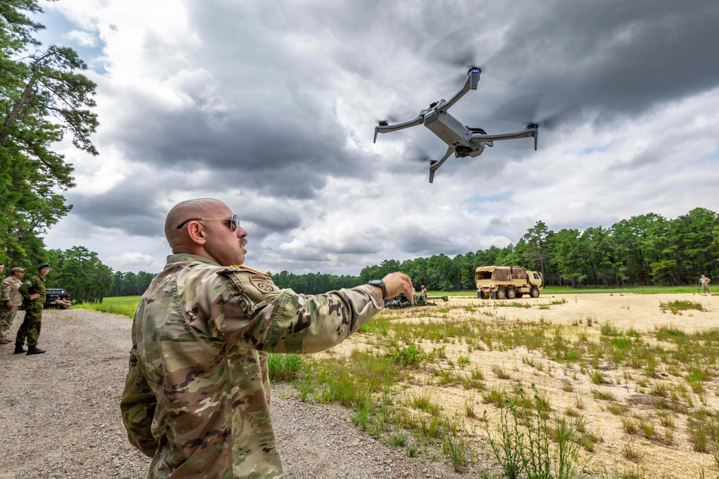 Army Staff Sgt. Steven Cenni flies the Skydio X10D small unmanned aircraft system during cover and concealment training at Joint Base McGuire-Dix-Lakehurst, N.J., July 29, 2026.