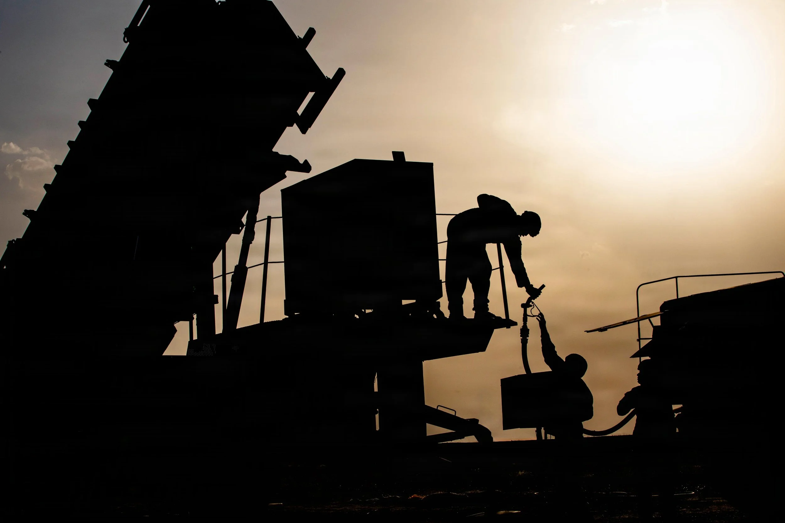 Army petroleum supply specialists prepare to fuel a generator for a Patriot missile system in the U.S. Central Command area of operations in the Middle East, June 26, 2026.