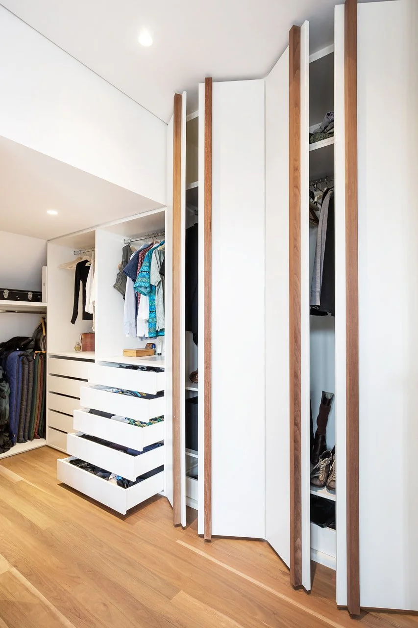 Custom wardrobe with multiple storage solutions