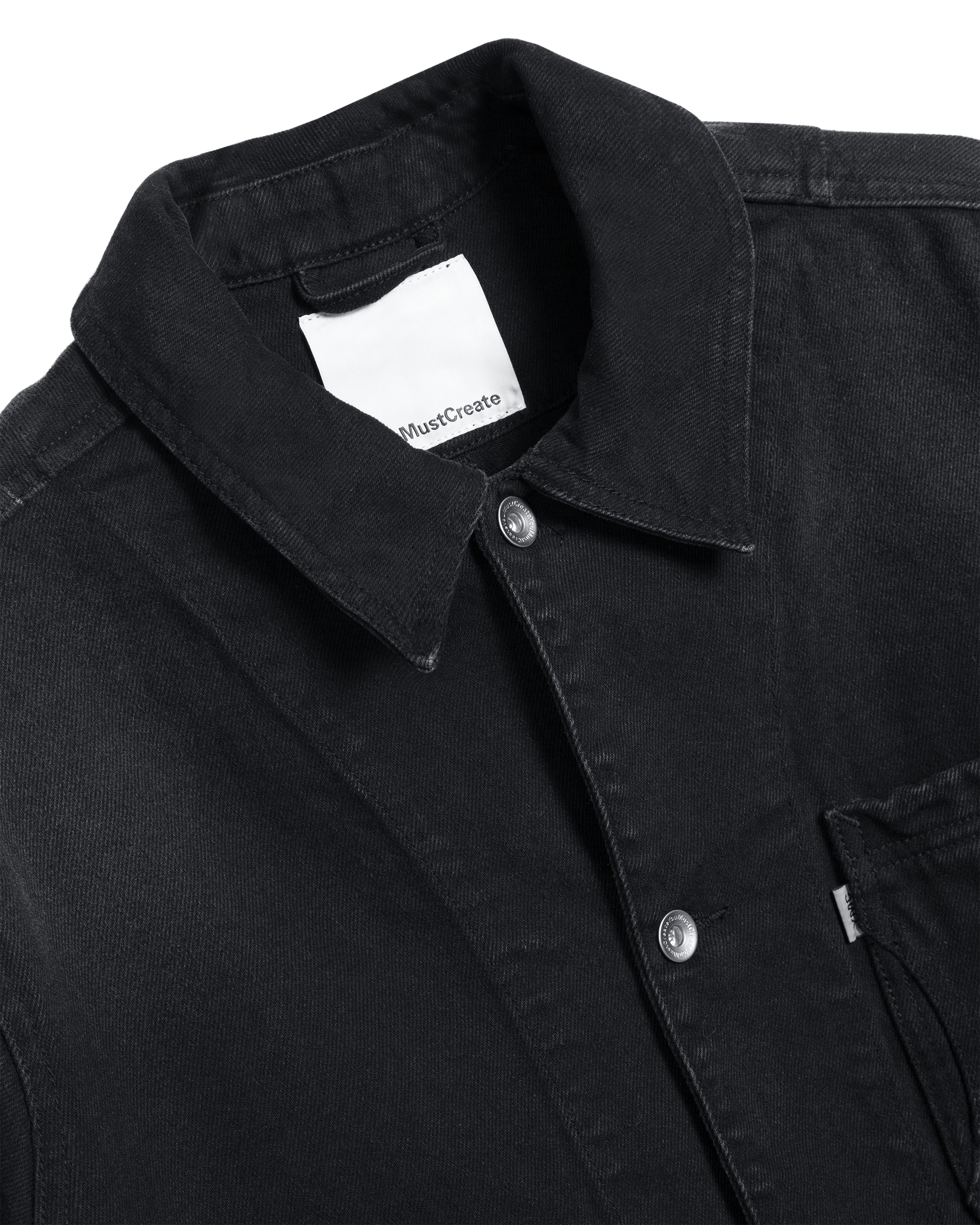 Shop the YMC Construction Jacket in black organic cotton denim. A durable unisex workwear jacket featuring a relaxed fit, premium construction, and timeless utility style.