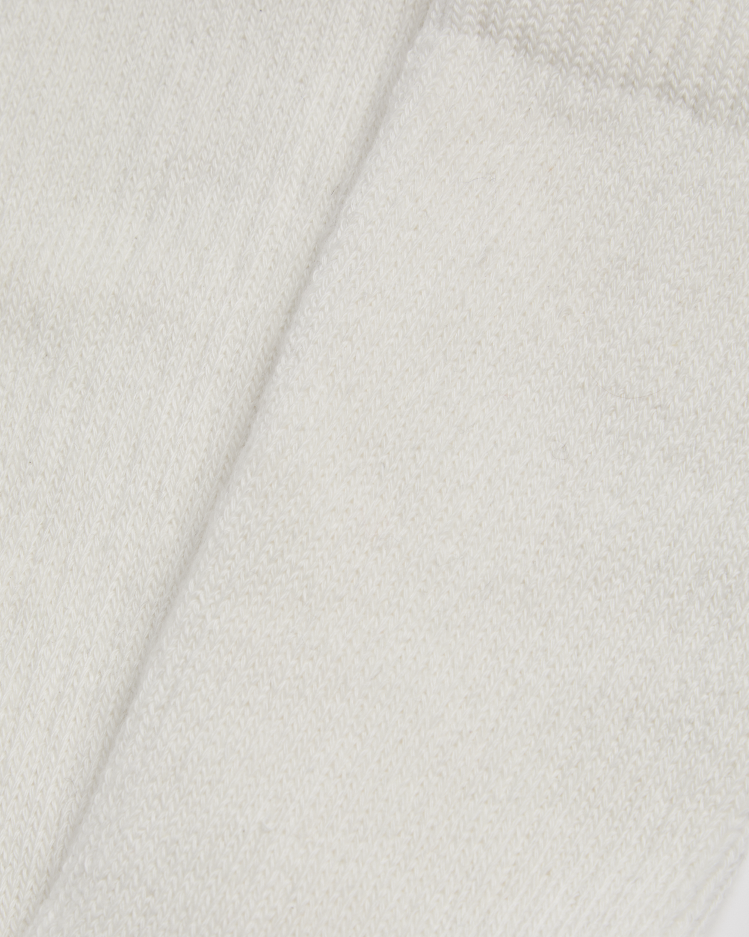 Shop the YMC Earth Solid Socks in White. Comfortable cotton blend socks with a clean minimalist design, perfect for everyday wear. Discover premium essentials from YMC (You Must Create).