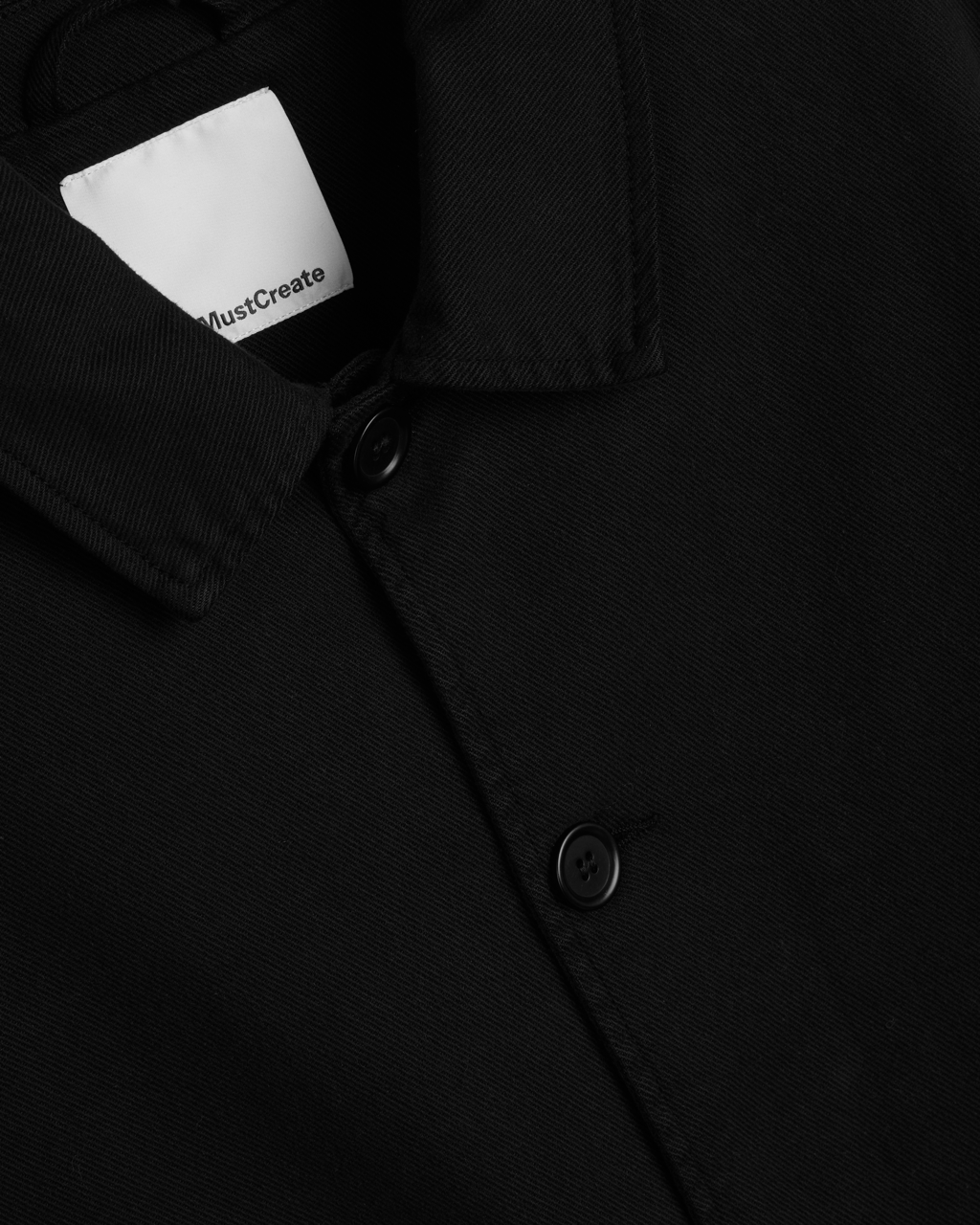 Unisex black utility jacket styling detail