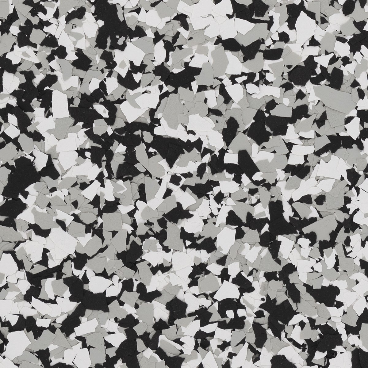 Close-up of a speckled pattern with black, white, and gray fragments.