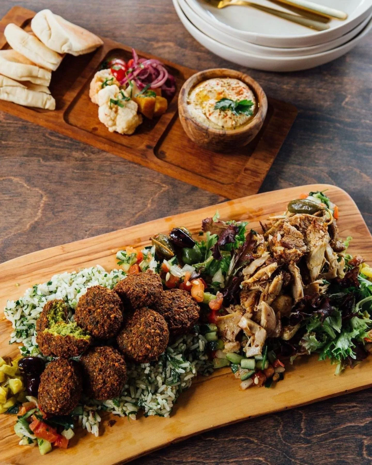 @fredsmeatbread isn&rsquo;t the only one with Super Bowl Party game . . . Yalla can set you up with a sweet spread! Falafel, shawarma, pita, hummus, baba ganoush &mdash; the works. 📷: @thekrogdistrict #yallaATL #superbowlparty #middleeasternfood #fa