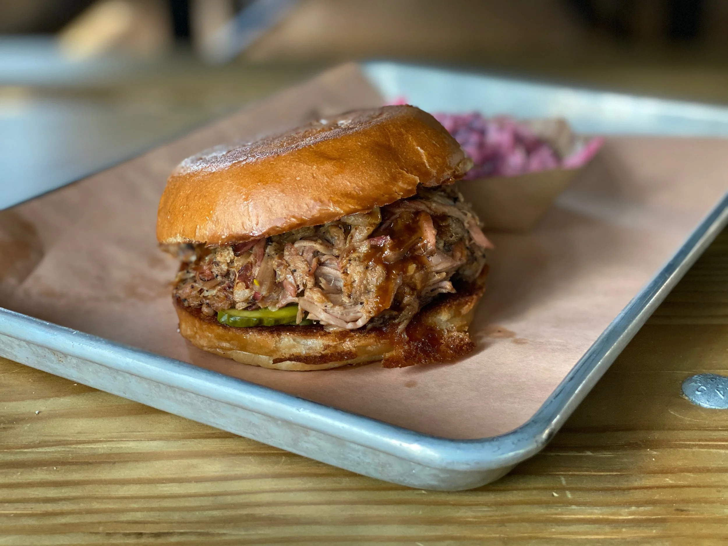 National BBQ Day? You&rsquo;ve come to the right place. We smoke pork, brisket, turkey, and chicken, and our own sausages. Get a sandwich or a meat plate, or try one of our new menu items that we rolled out last week! And wash it all down with a beer
