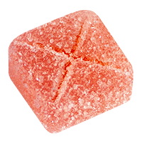 Pink sugar-coated gummy candy cut into a quarter