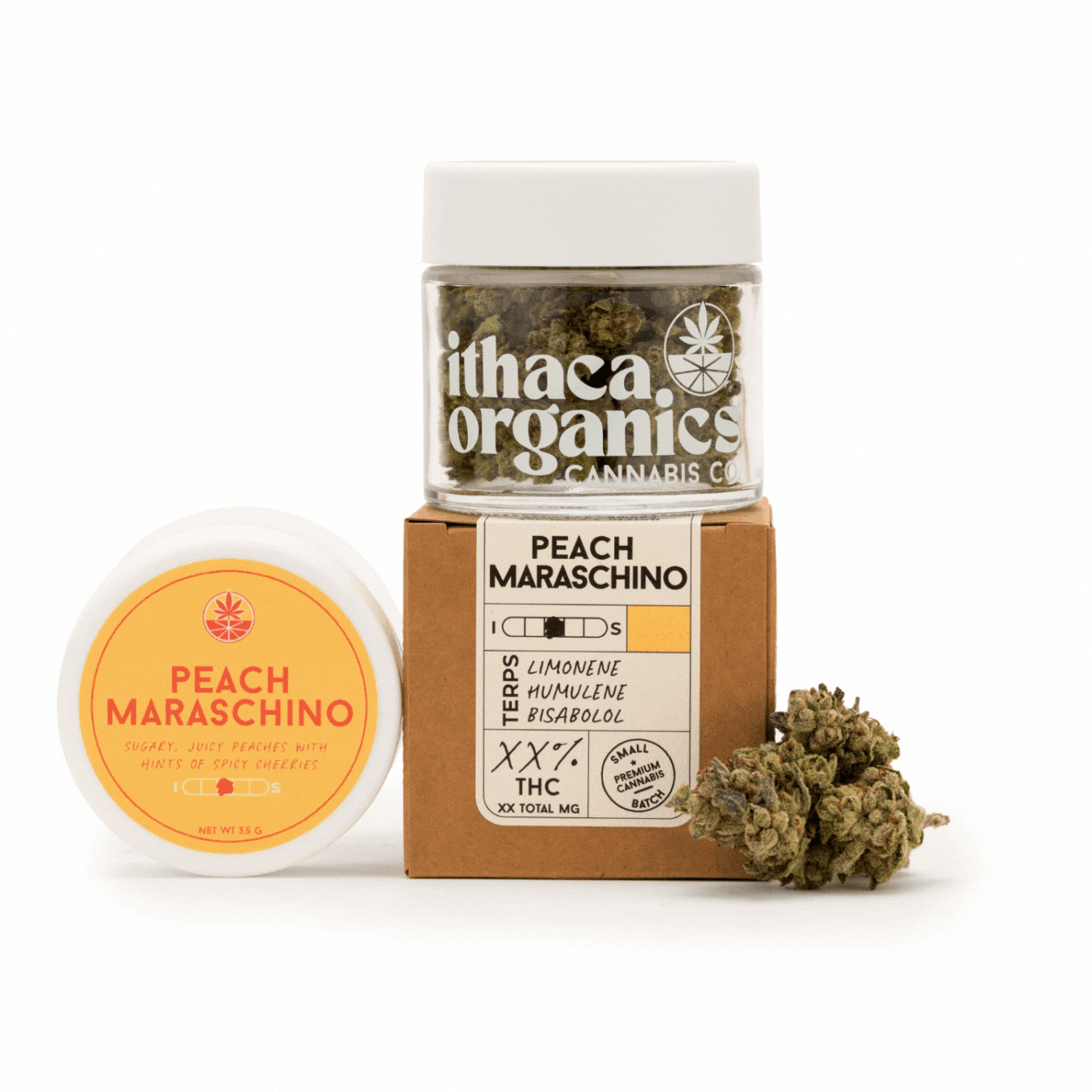 Cannabis products including a jar of Ithaca Organics cannabis, a small container of Peach Maraschino cannabis with spicy cherries, a box labeled Peach Maraschino, and a cannabis bud on a white background.