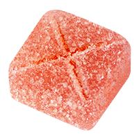 A pink sugar-coated gummy candy shaped like a cube with a cross pattern on top.
