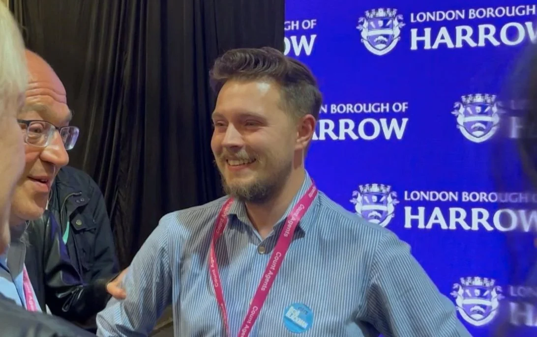 Matthew Goodwin-Freeman at the Harrow East 2024 Election count in front of a "London Borough of Harrow" backdrop.