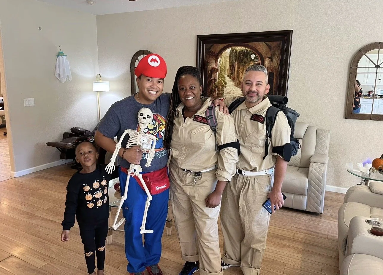 Support With Heart: A smiling team in matching uniforms poses with staff and family members during a fun, hands-on visit—celebrating togetherness and community care.