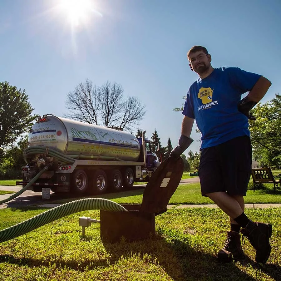 septic-pumping-technician-with-hose-square.jpg