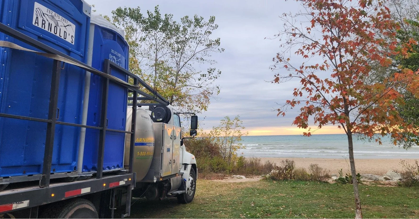 Crisp air, golden leaves, and a lakeside view, just another picture-perfect day on the job 🍂💧 #FallInWisconsin #ArnoldsOnTheMove #WheresArnold #PortableRestrooms