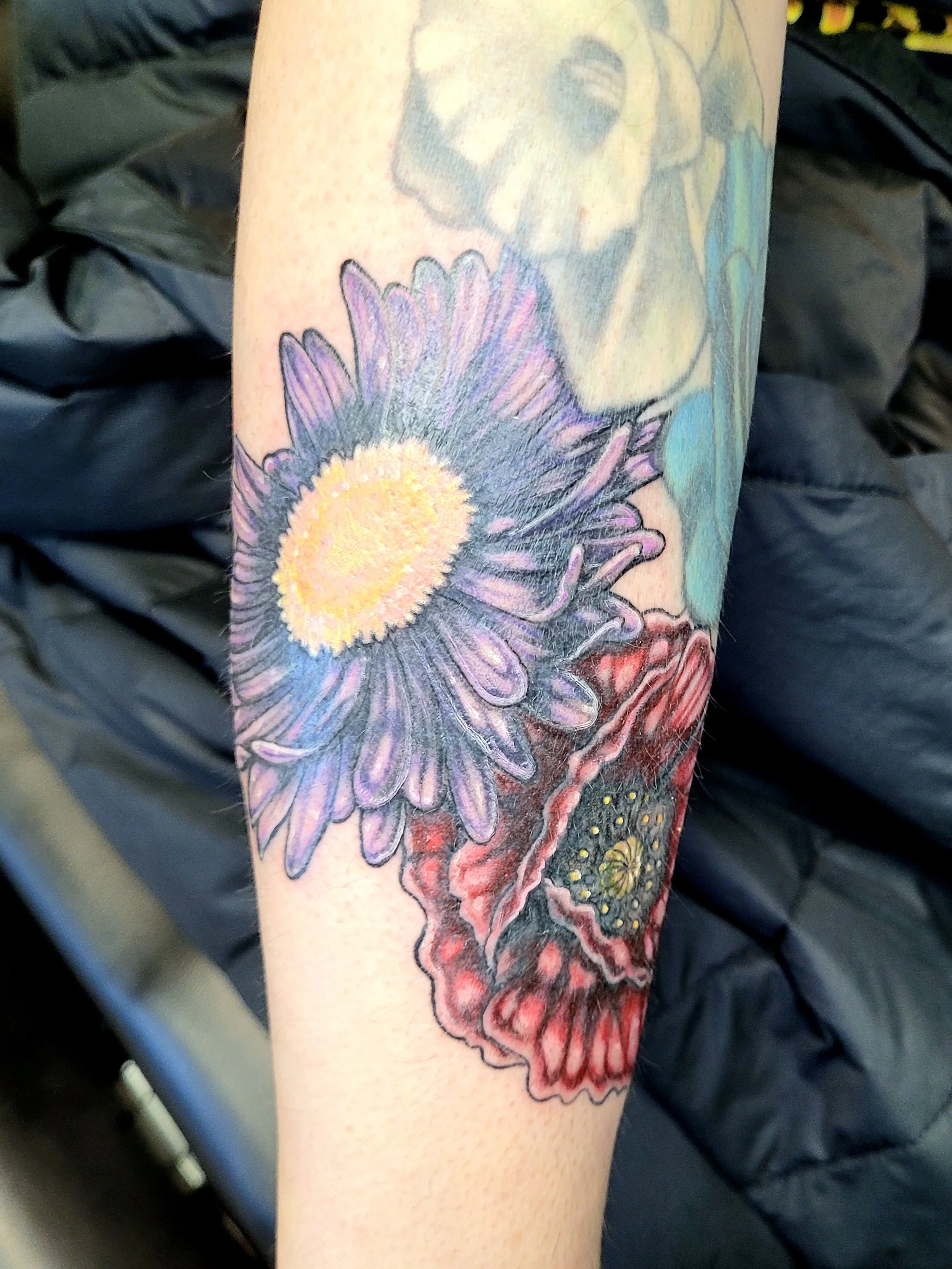 This is a cover up piece over an old infinity sign