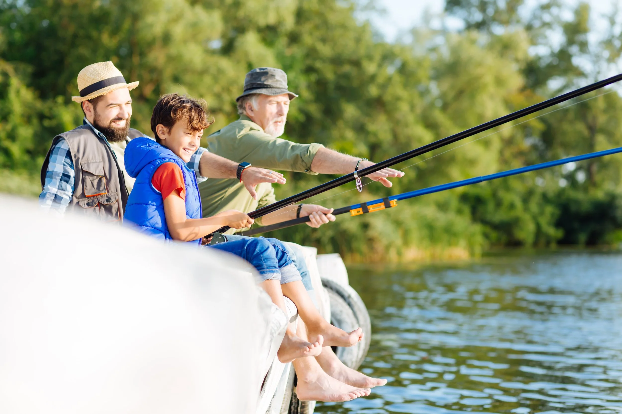 boy-feeling-happy-while-fishing-with-father-and-gr-2023-11-27-05-01-24-utc-min.JPG