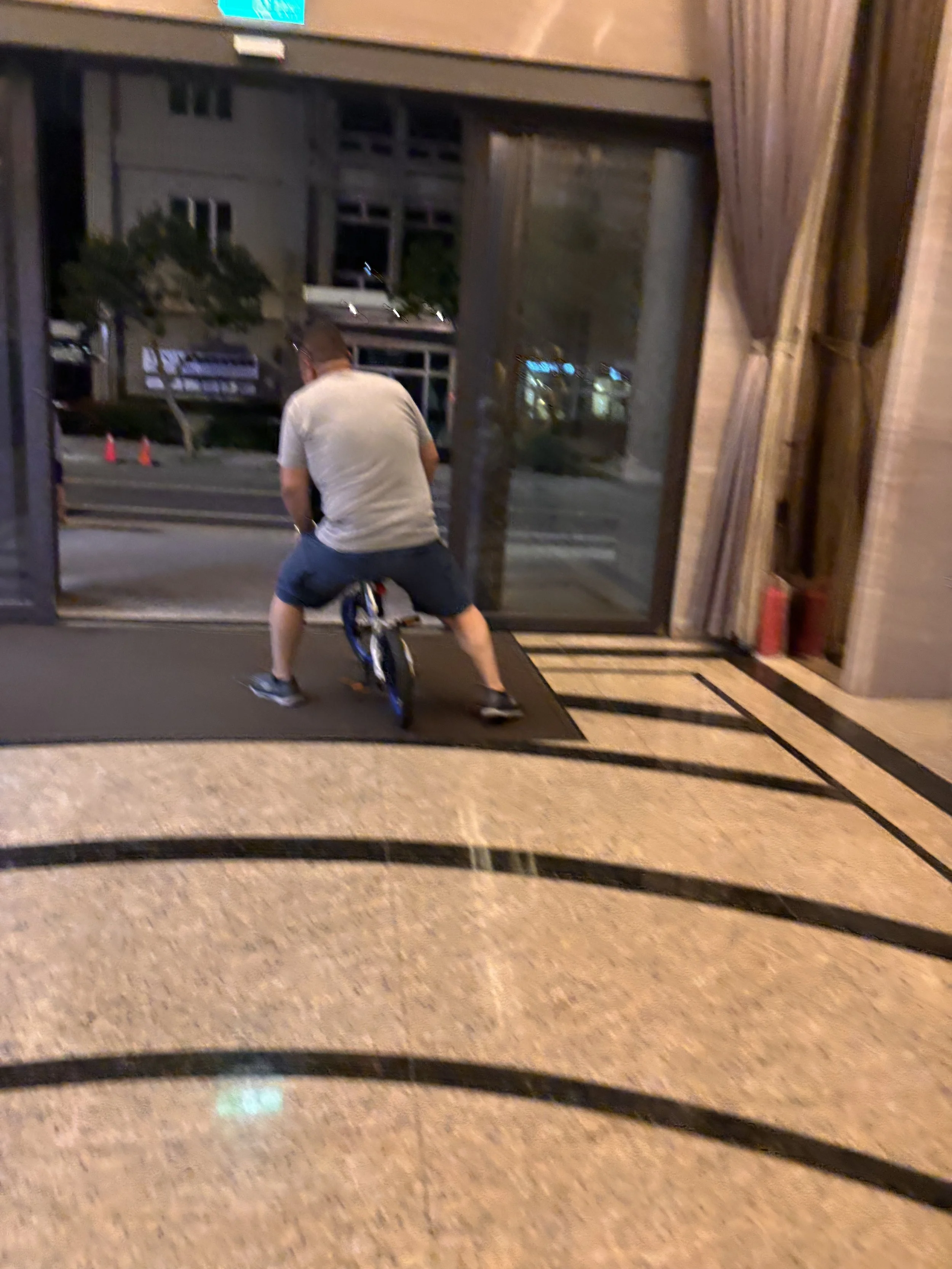My grunkle showing his kids how to ride their bike