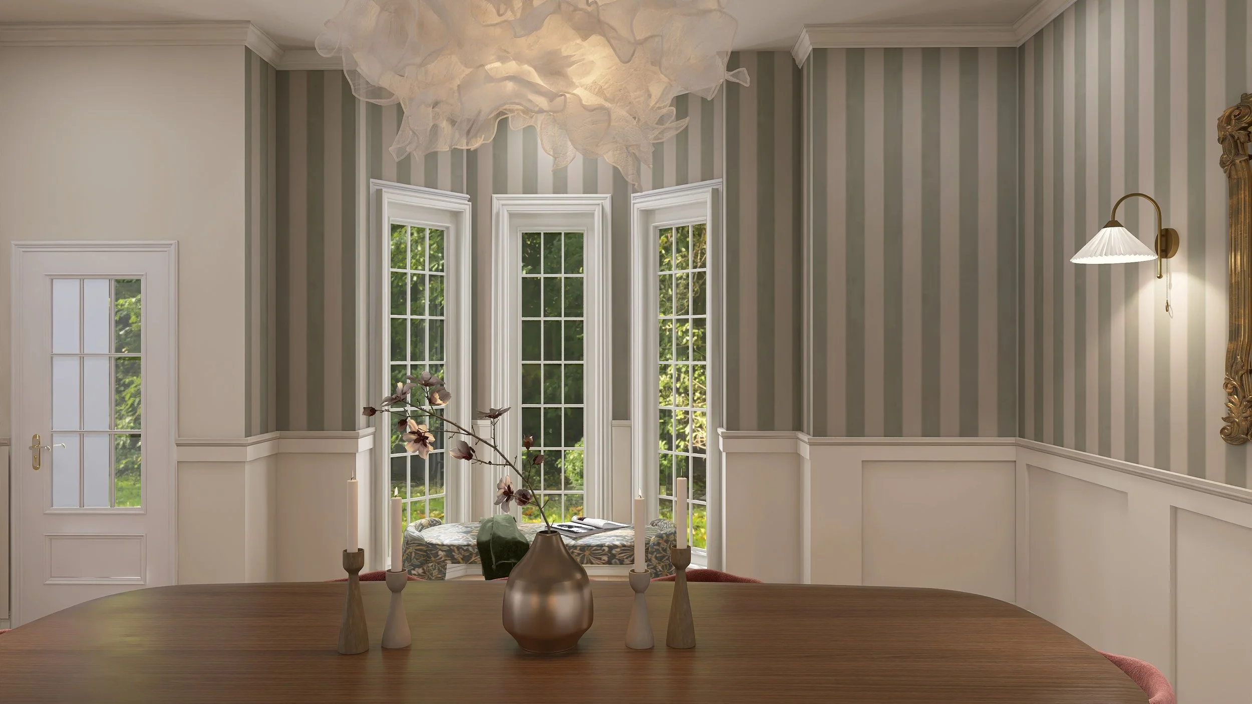 Interior of a room with large bay windows, striped wallpaper, a wall-mounted lamp, a decorative sculpture on a column, and a table with candles and a vase with flowers.