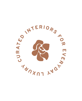 Circular logo with text 'Curated Interiors for EveryDay Luxury' surrounding a stylized brown flower or plant illustration.