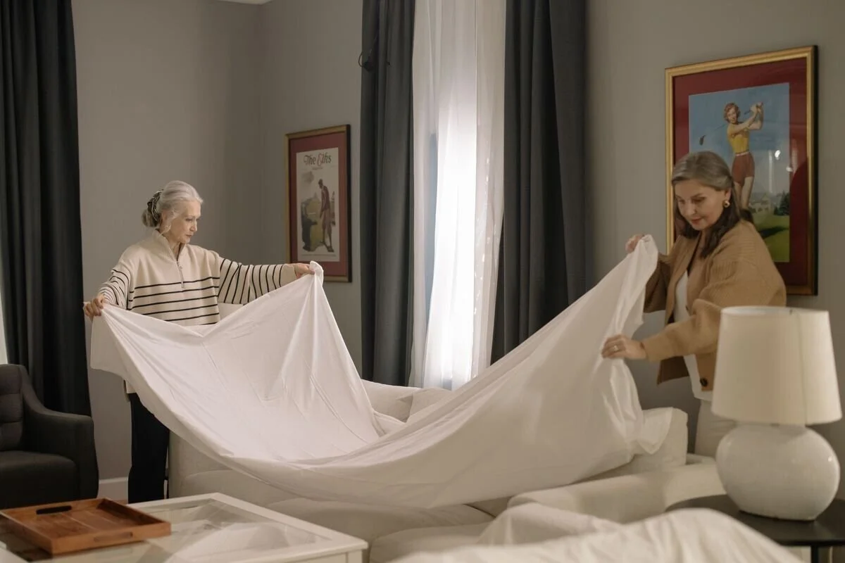 A caregiver helping tidy up around the home