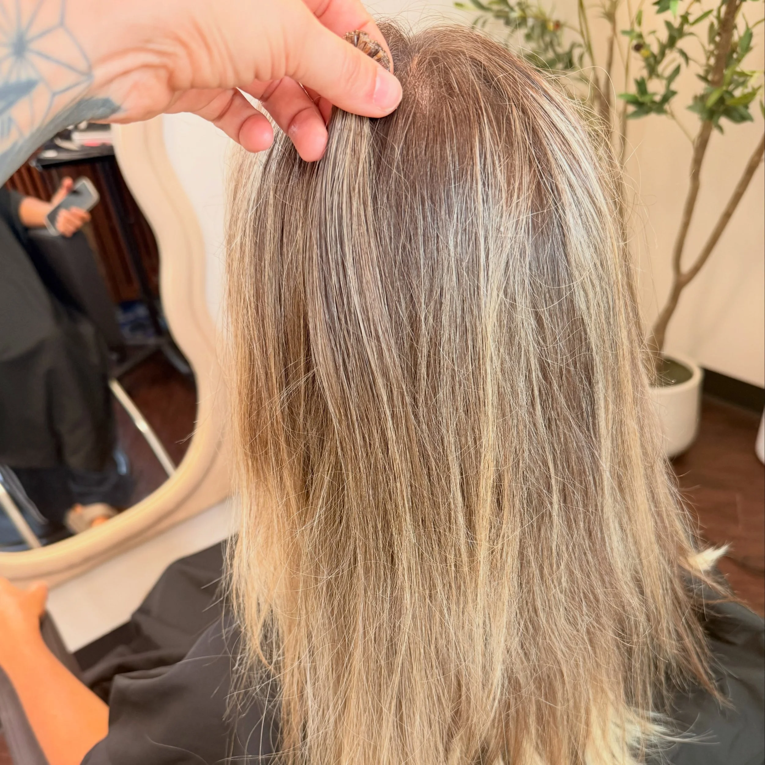 The most important part of extensions often happens before a single strand is installed. I don&rsquo;t choose a color, I curate a perfect blend.

For every client, I hand select from multiple single donor bundles to recreate the natural highs, lows, 