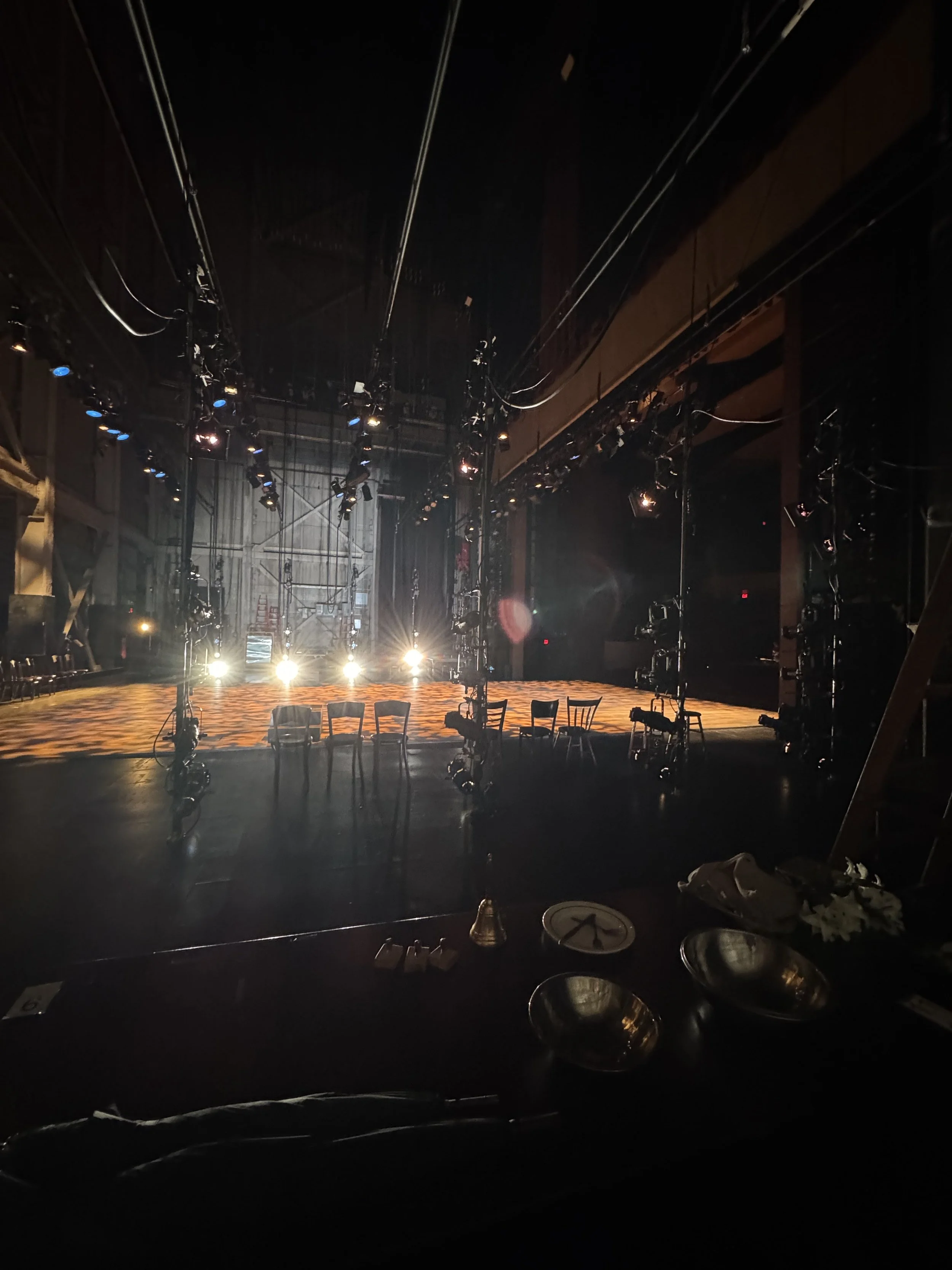 A picture from backstage while on deck crew for "Our Town" at Cleveland Play House. Towards the bottom, there are props visible and I was mainly on props for this show especially due to my attention to detail.