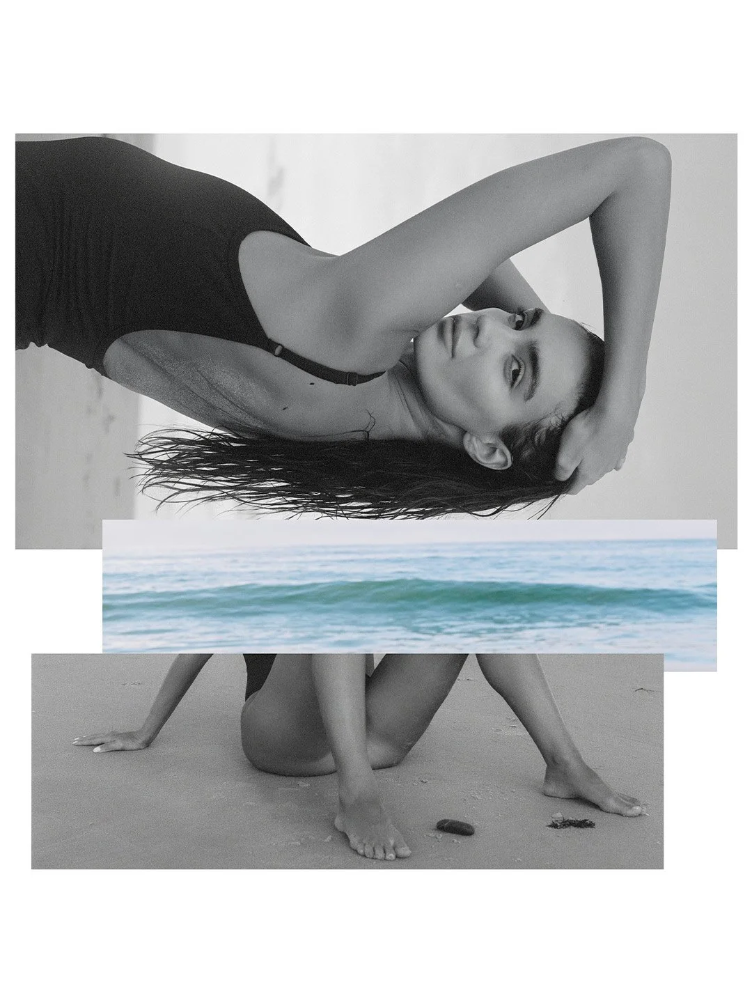 A woman with long wet hair in a black swimsuit lying sideways on a beach, with her right arm raised and her hand touching her head, looking into the camera.