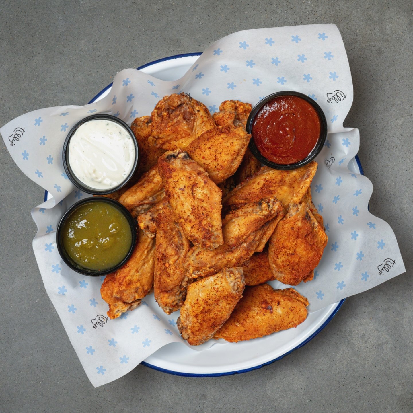 Harissa-rubbed jumbo wings with Fresno &amp; pineapple sauce and pimped ranch&mdash;just in time for playoffs.