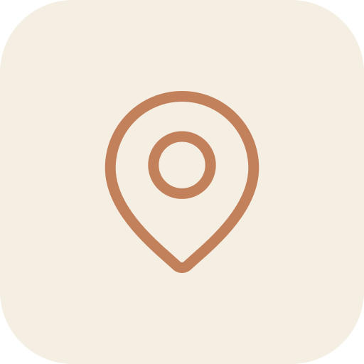 A generic location pin icon on a beige background.