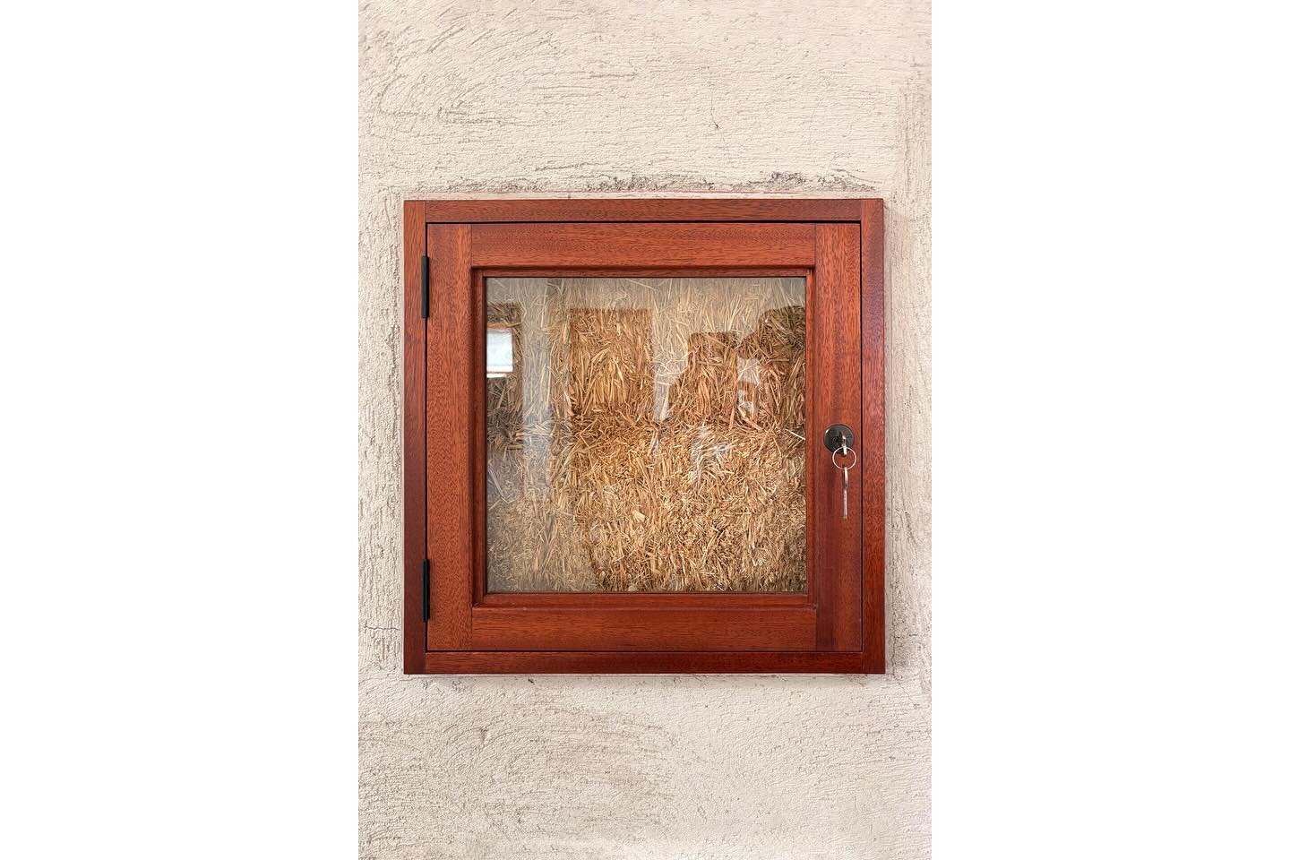 Custom strawbale truth window made for good friends during the construction of their strawbale home in Southern California.