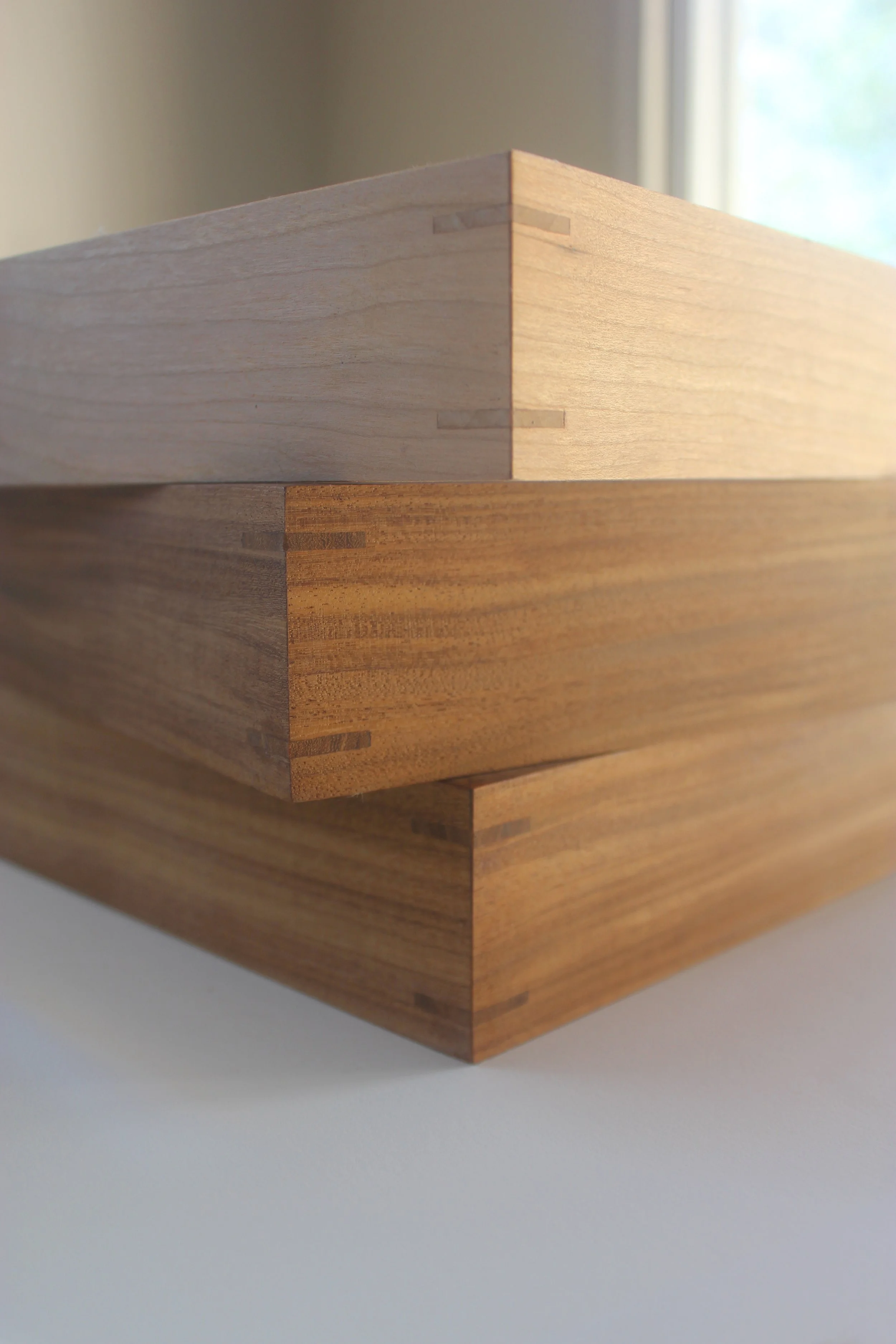 Detail photo showing solid wood gallery frames with double splined miter joinery.