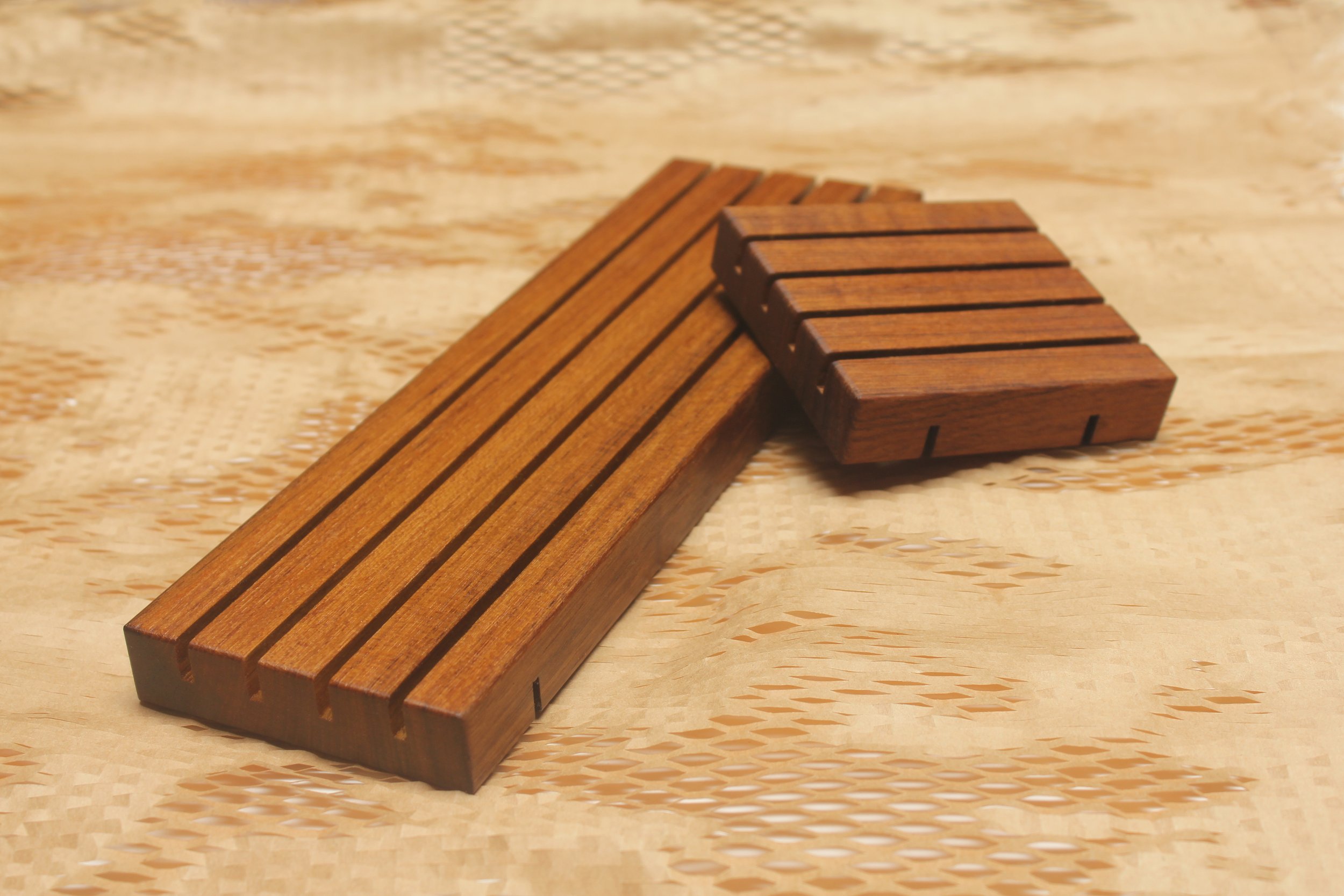 A long and standard size teak wooden soap tray. Each tray is made of FSC Certified genuine teak (tectona grandis) with a 100% natural tung oil finish.